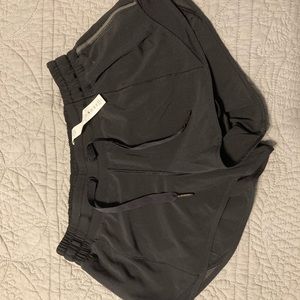 Black lululemon hotty hot shorts, size 6